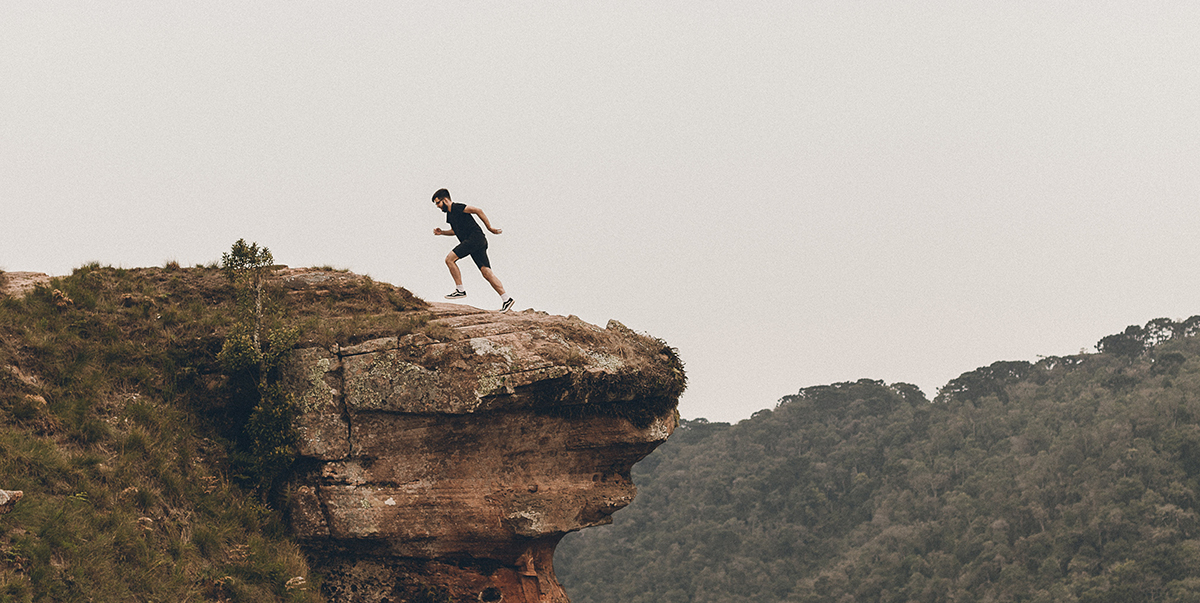 man running on cliff